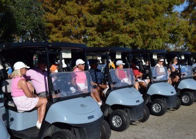 golf carts lined up for the coastal alabama couples classic