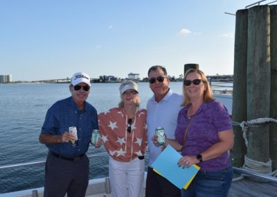 couples on dock after the coastal alabama couples classic
