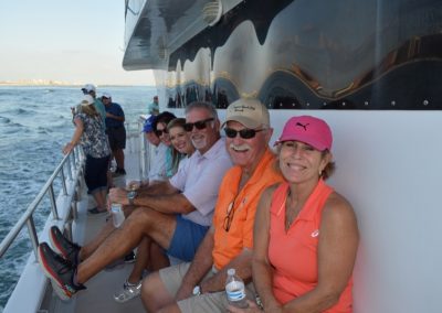 couples on sunset cruise after the coastal alabama couples classic