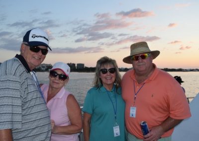 two couples on sunset cruise